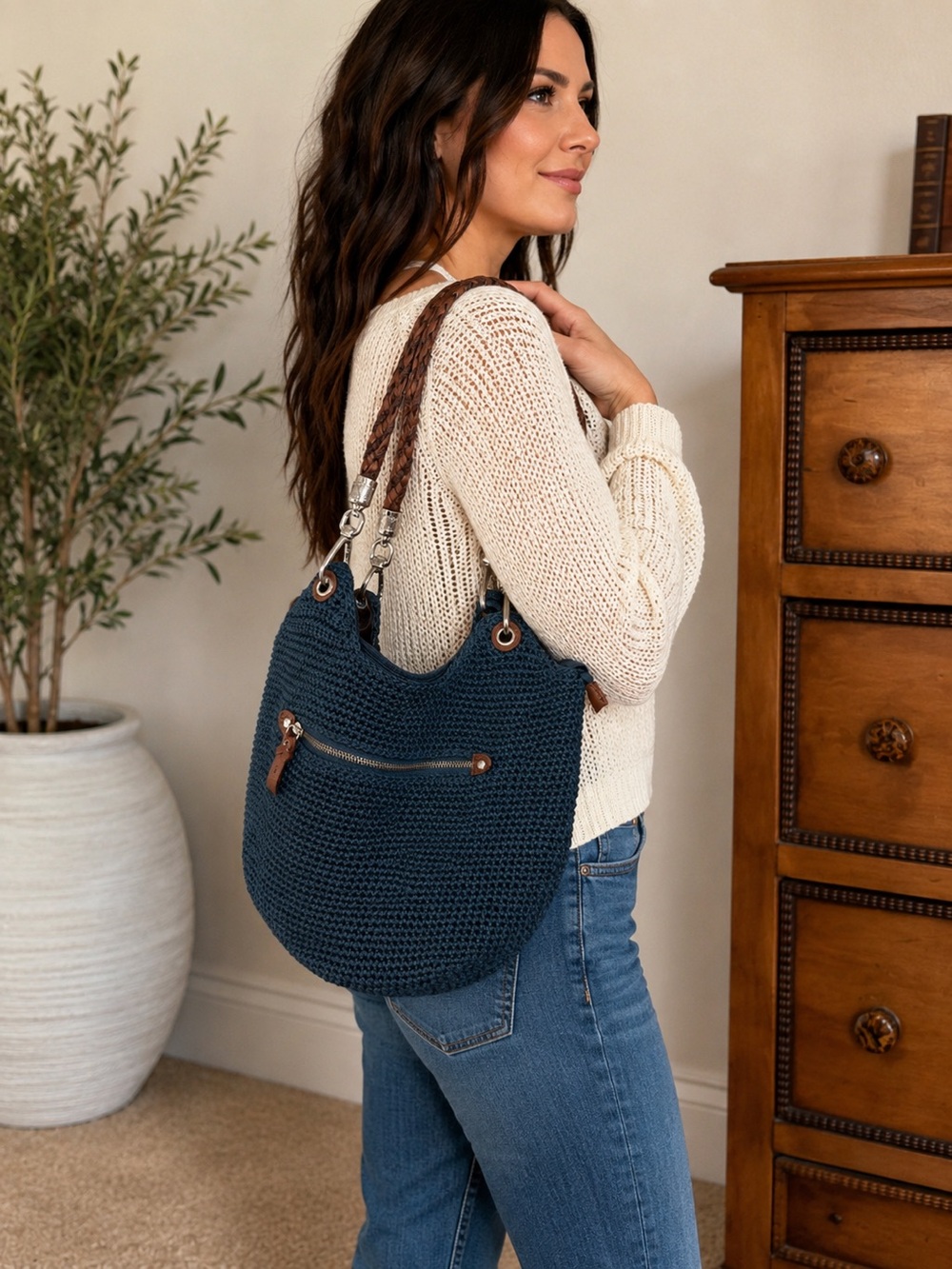 The Sak Blue Crochet Hobo Bag with Brown Braided Handles